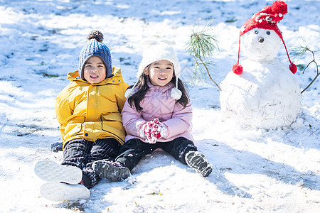 快乐儿童和雪人图片