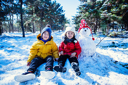 快乐儿童和雪人图片