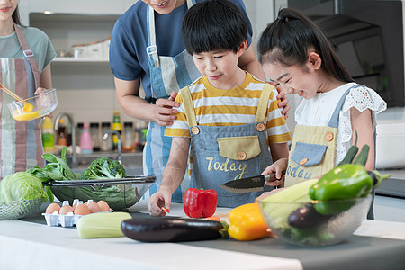 妈妈儿子年轻父母教孩子学做饭背景