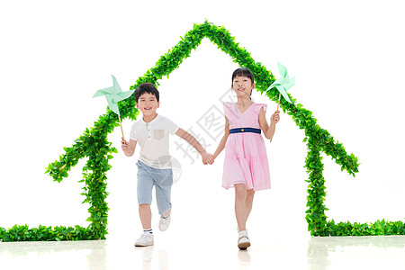 儿童风车绿色房子下的快乐儿童背景