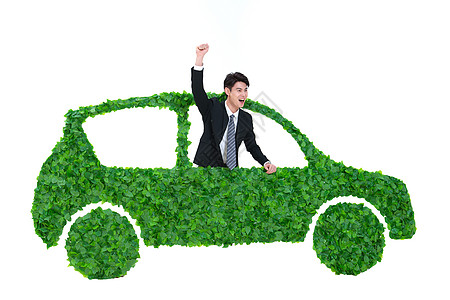 汽车 概念青年商务男士驾驶绿色环保汽车出行背景