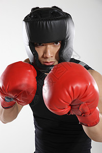 东方青年男子拳击运动图片