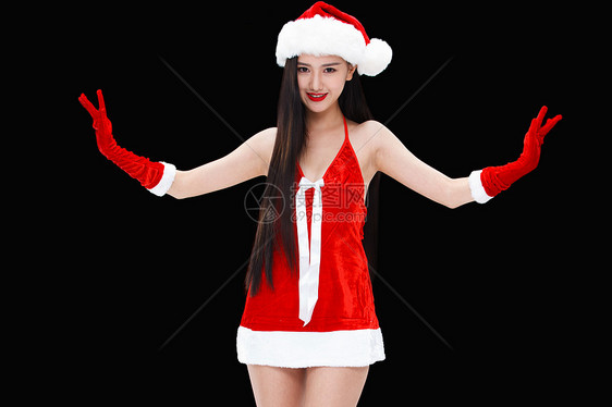 穿圣诞服的年轻女人图片