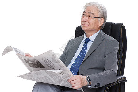 商务老年男人拿着报纸图片