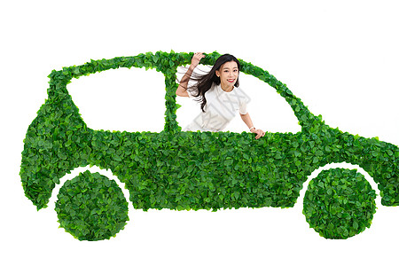 汽车 概念青年商务女士驾驶绿色环保汽车出行背景