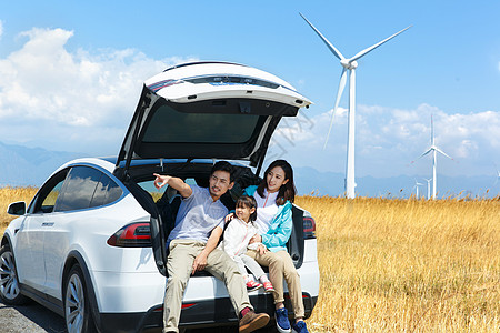 汽车涡轮快乐家庭坐着汽车里背景