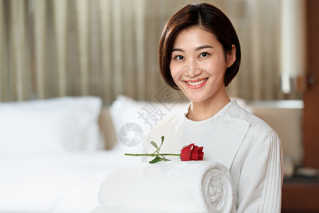 玫瑰花女人酒店服务员背景