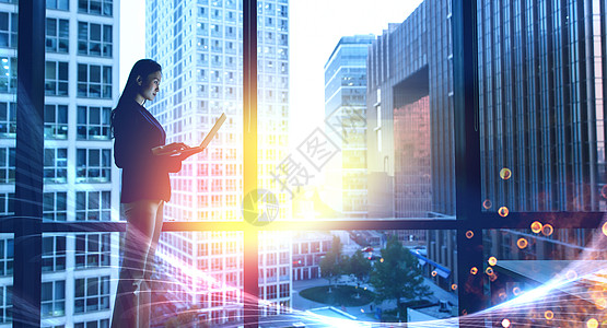 互联网金融科技背景年轻商务女士站在玻璃窗前背景
