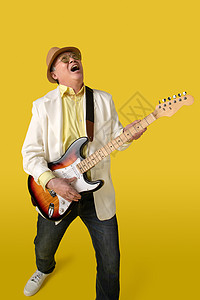 吉他弹奏弹吉他的快乐老年人背景