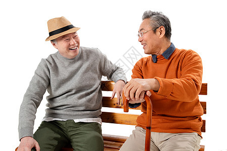两位老年朋友坐在长椅上聊天图片