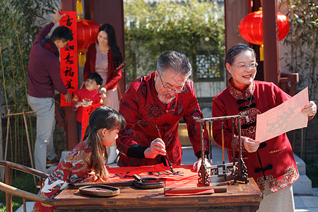 毛笔元素快乐家庭过新年写春联背景