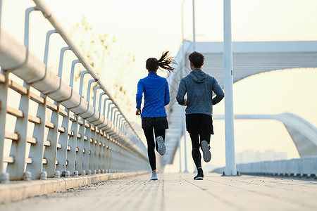 北京马拉松青年情侣户外慢跑背景