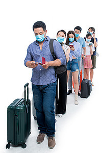 拿着行李戴口罩排队等待的旅客图片