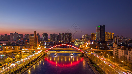 高空航拍夜晚的天津海河cbd建筑夜景图片