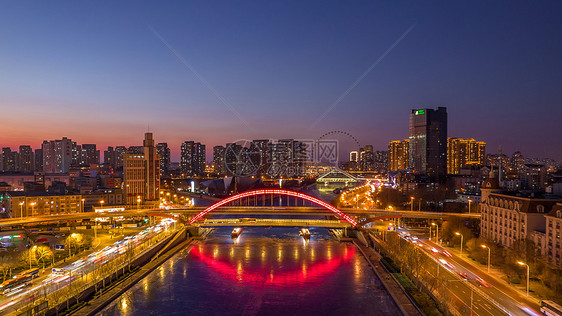 高空航拍夜晚的天津海河cbd建筑夜景图片