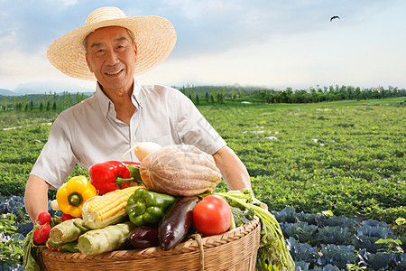 农民在田头拿着一筐蔬菜图片素材