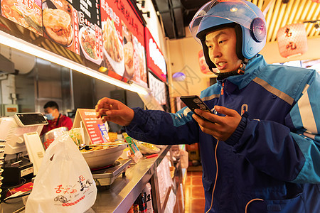 外卖员在餐厅取餐图片