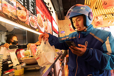 外卖员在餐厅取餐图片