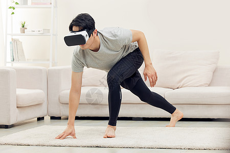 VR虚拟世界男性居家使用vr眼镜锻炼背景