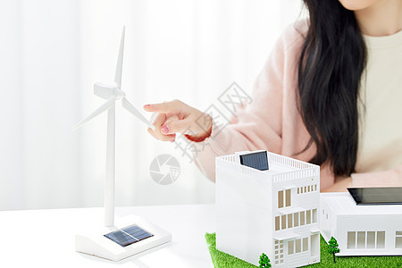 桌上的风力发电风车模型背景图片