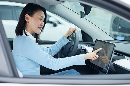 科技汽车线条女性点击汽车内电子屏幕背景