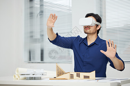 房屋建模建筑设计师使用vr设备虚拟滑动屏幕背景