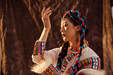 藏族女性少数民族形象背景图片