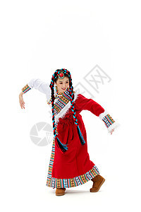 穿着藏族服饰舞蹈的女性图片