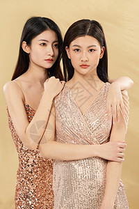 金色时尚美妆双人形象背景图片