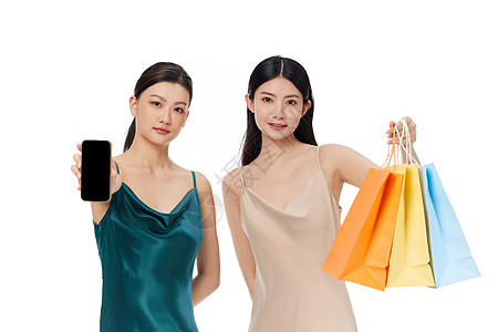 手机优惠拎着购物袋的闺蜜女性展示手机背景