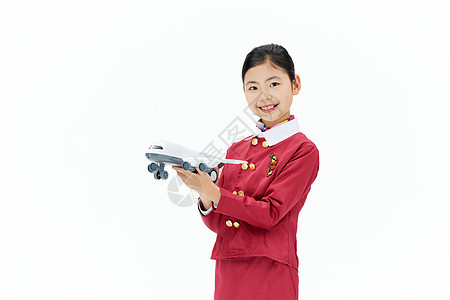 手拿飞机模型的小小空姐图片
