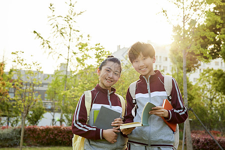 放学后小学生讨论学习形象背景图片