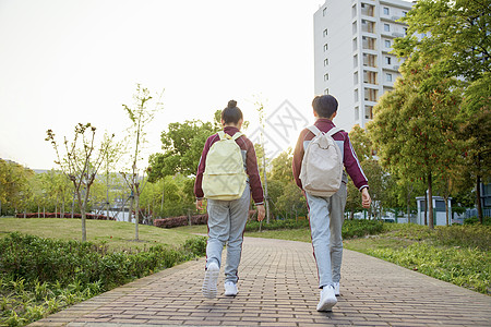 六一儿童节放学的小学生背影背景