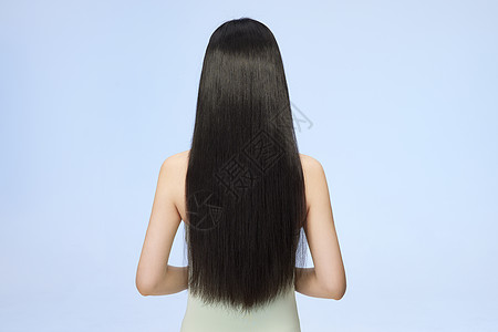 年轻女性护发背影高清图片