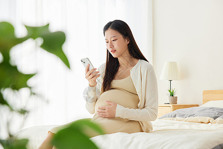 打电话的女人居家孕妇准妈妈打电话背景