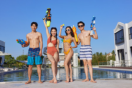 夏日泳池派对的年轻男女们图片