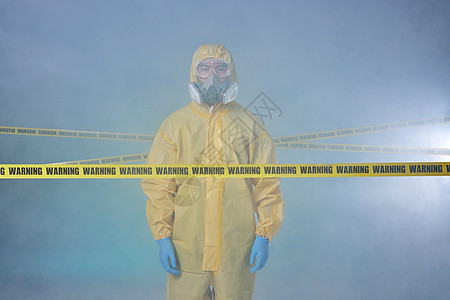 核污染现场拉警戒线的防护人员背景图片