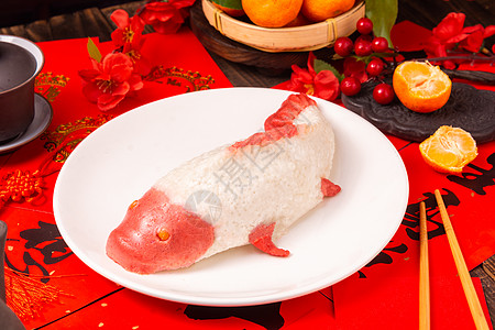 2024春节期间家里的年年有鱼糯米饭背景