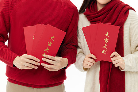 春节红包青年情侣手举红包特写背景