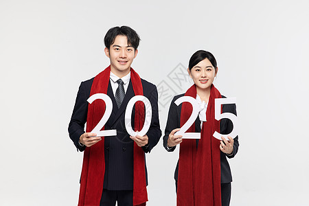 年轻商务男女开心迎2025图片