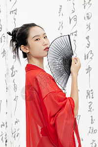 手拿折扇的中国风古装美女图片
