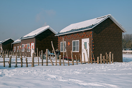 冬季冰雪小木屋背景图片