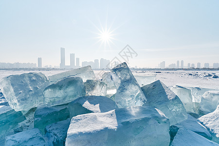 哈尔滨冰雪大世界松花江采冰场背景图片