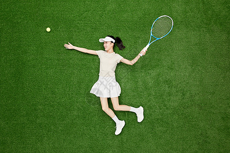 创意俯拍定格运动美少女打网球的瞬间图片