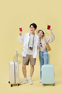 提行李箱装备齐全准备旅游的年轻小情侣形象背景