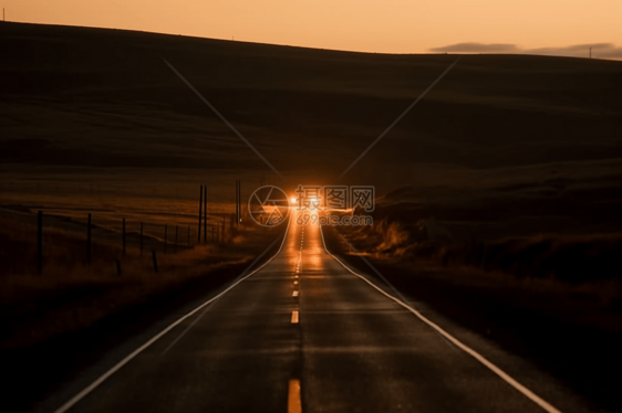 空旷道路上的车灯图片