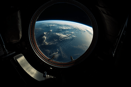 从太空舱窗口看地球背景图片