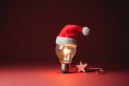 红色圣诞帽下发光的灯泡图片