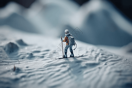 穿着滑雪装备在雪山上滑雪的人图片
