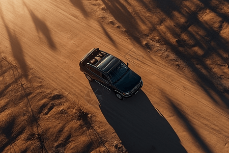 沙漠里的黑色汽车图片